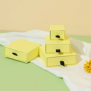 Yellow drawer jewelry box set with fabric pull for rings necklaces and bracelets