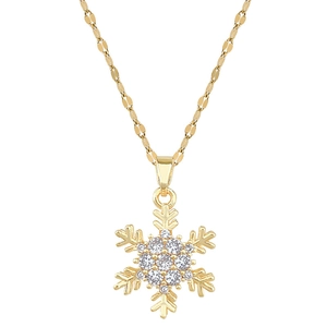 Elegant gold spinning snowflake necklace with sparkling crystals on white background