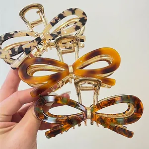 Lot de pinces à cheveux noeud en acétate vintage avec motifs écaille de tortue et métal