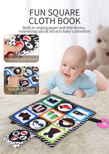 Detail of baby soft book with high contrast patterns and built-in squeaker for sensory play