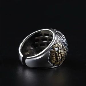 Retro hip hop silver and gold eagle anchor signet ring for men on black background