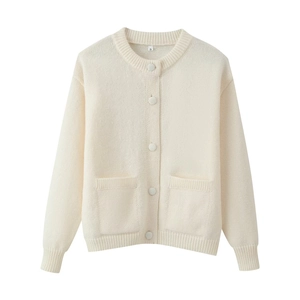 Women's crew neck buttoned knit cardigan in cream white with dual front pockets