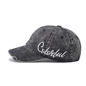 Vintage washed black denim baseball cap with Colorful embroidery and distressed details