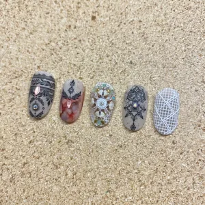 Relief nail stickers with black lace, marble patterns, pearls, and white grid textures
