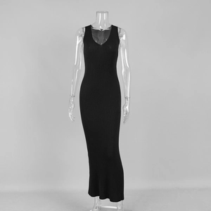 Close-up of black V-neck ribbed knit maxi dress showing slim fit design and texture
