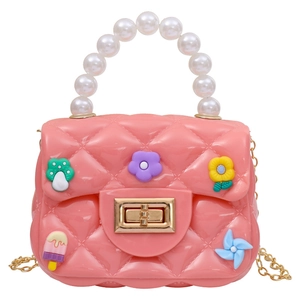 Pink jelly mini bag for girls with pearl handle and colorful cartoon DIY patches