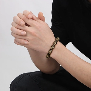 Detailed view of vintage gold plated tiger head stainless steel bracelet for men