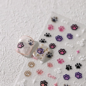 3D embossed cat claw nail stickers with cute paw prints and stars in various colors