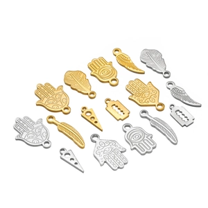 Detailed collection of assorted gold and silver Hamsa and feather charms for DIY jewelry