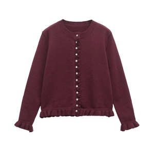 Girl's knit cardigan in dark burgundy featuring classic white buttons and ruffled edges