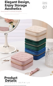 Quilted velvet jewelry boxes in pink, blue, and green on a dressing table