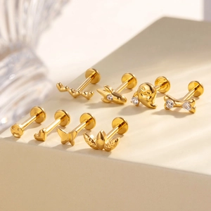 Titanium alloy body jewelry set featuring golden butterfly and crown flat back studs