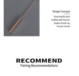 Detail of 18k rose gold minimalist bar pendant with delicate steel link chain