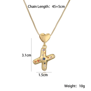 Detailed jewelry measurements showing 45+5cm chain and 3.1cm colorful letter X pendant