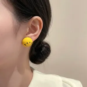 Fashionable yellow smiley face stud earrings in silver minimalist Korean style design