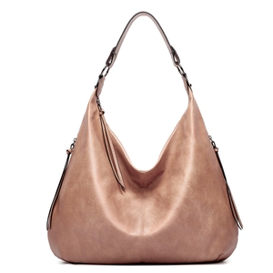 Detail of pink soft leather hobo bag featuring metal ring and decorative tassel zipper