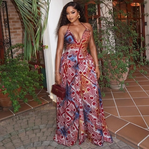 Bohemian geometric print halter maxi dress with backless design and deep V-neckline
