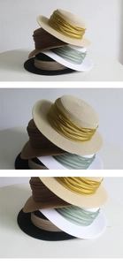 Detailed close-up showing texture of straw hats with elegant satin ribbon bands in varied colors