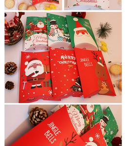 Detail of Christmas gift boxes with Santa, snowman and reindeer motifs for festive cookies