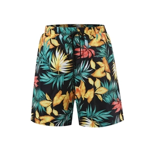 Détail du short de bain pour homme avec imprimé feuilles tropicales et cordon serrage