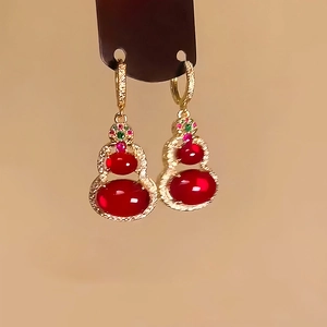 14k gold plated wulu drop earrings with red gemstones and sparkling zircon accents