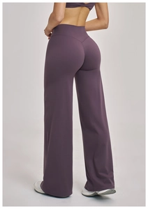 Detail view of high-waist wide-leg purple yoga pants showing the back V-shaped hip contour