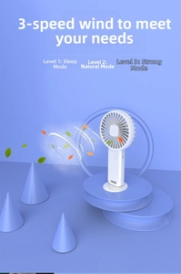 Detail of white mini handheld fan showing three-speed wind control and circular base