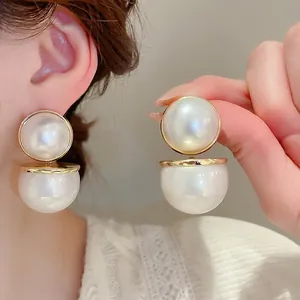 Boucles d'oreilles rétro doubles perles surdimensionnées avec détails dorés