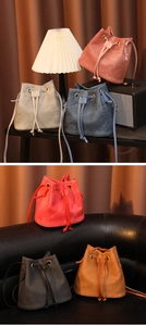 Detailed collection of drawstring bucket bags in pink, blue, red, and neutral suede tones