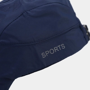 Detail of dark blue quick-dry duckbill cap featuring side air vents and SPORTS print