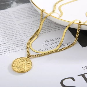 Double-layered gold titanium steel necklace featuring a religious pendant and snake chain