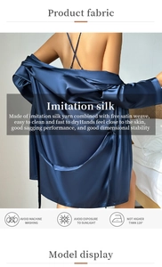 Detail showing the navy blue satin robe texture and five satin weave fabric quality