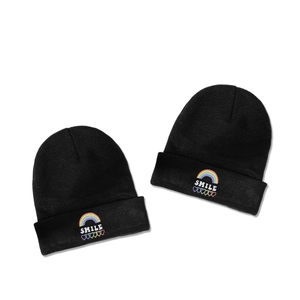 Fashionable black knit beanie with colorful rainbow smile and heart embroidery detail