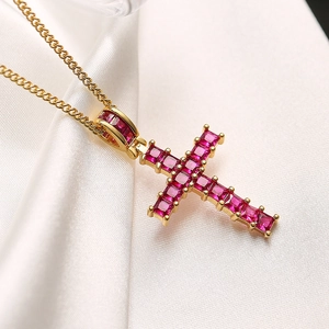 Luxury gold plated cross pendant necklace with red square crystals on white silk