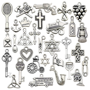 Antique silver alloy charms set featuring crown, key and cross designs for DIY jewelry