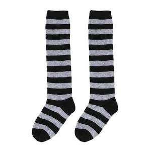 Close-up of black and grey striped over-knee socks in soft cotton knit fabric