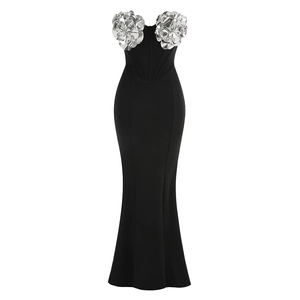 Detail of silver floral embellishments on strapless black mermaid evening gown