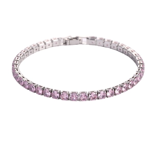 Silver tennis bracelet featuring round pink cubic zirconia stones and a secure box clasp
