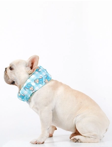Detail of blue monster pattern pet cooling collar with soft fabric texture and stitching