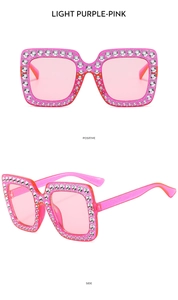 Macro view of oversized square light purple pink sunglasses with sparkling rhinestones