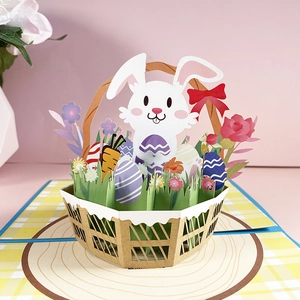 3D pop-up Easter card featuring a white bunny and colorful eggs in a flower basket