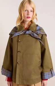 Detail of army green cotton jacket with blue plaid patchwork collar and cuffs