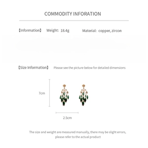 Detailed chart showing 18.4g weight and 7cm length for these green zircon drop earrings
