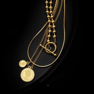 Three-layer gold pendant necklace with queen coin, snake chain, and stylish OT buckle