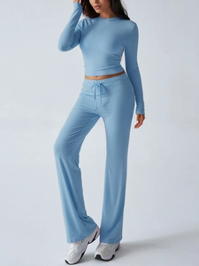 Detailed view of light blue Y2K slim fit long sleeve top and drawstring jogger set