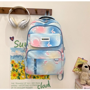 Blue and pink gradient backpack with star and butterfly prints and FASHION tag