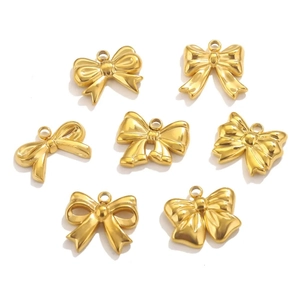 Set of seven polished gold stainless steel bow pendants for DIY jewelry making