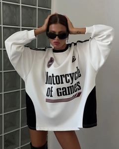 Detail of white cotton sweatshirt with black Motorcycle of Games print and side panel