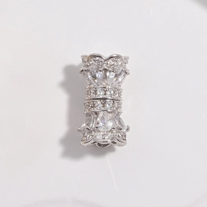 Macro shot of silver sterling clasp encrusted with cubic zirconia for DIY jewelry