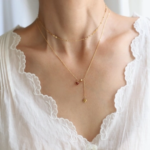 Double-layered gold-plated heart pendant necklace for women in minimalist French style